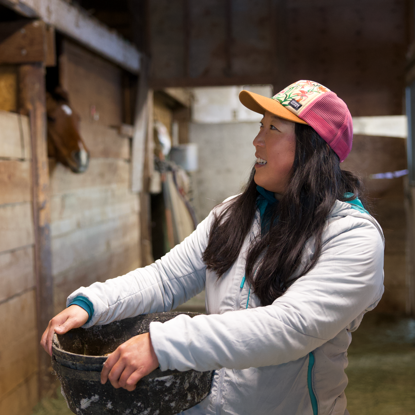 Threatened Lili Flowers Trucker Hat worn by horse lady Baseball and Soft Recycled Mesh Hat by artist  Katherine Homes 